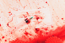 Splashes Of Blood Dripping Into The Sink In The Bathroom. Red Virus Molecules Syringe Medical Mask