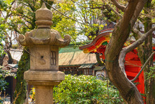 Kasuga-type Stone Lantern Recognizable By Its Warabi Fern Shapes Topped With A Giboshi Onion Shape In The Atago Temple In Tokyo Famous For Its Stairs Of Success And Plum Tree.