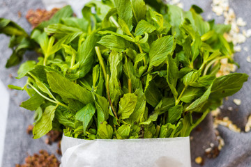 Oraganic fresh green bunch of mint, peppermint. Vegan calming tea herb. 