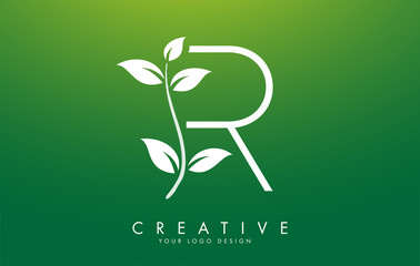 White Leaf Letter R Logo Design with Leaves on a Branch and Green Background. Letter R with nature concept.