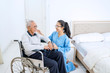 © Creativa Images - Friendly nurse and old patient smiling together