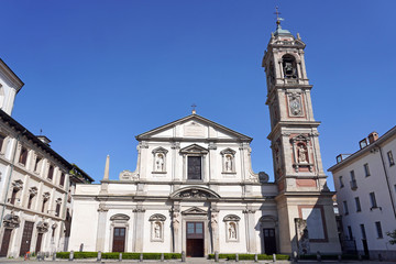  Italy , Milan - Basilic of Santo Stefano catholic church  in Downtown of the city empty of people during n-cov19 Coronavirus outbreak epidemic quarantine home, closed religious ceremony