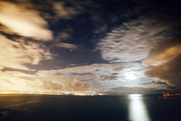 Wall Mural - fantastic starry sky over the sea.