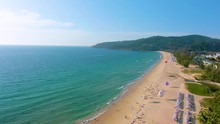 Aerial 4k View Flying Over Tropical Blue Ocean Towards Beautiful Green Mountains And White Sandy Beach