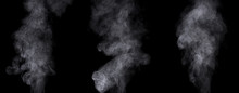 Set Of Different Steam Clouds Against Black Background.