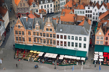 Wall Mural - beautiful Typical houses in Grote Markt, Bruges on a cloudy day.