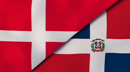 The flags of Denmark and Dominican Republic. News, reportage, business background. 3d illustration