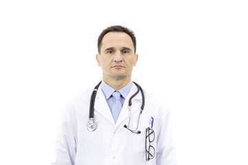 Poster - Portrait of a caucasian adult doctor in a white coat with a stethoscope over neck on a white background. Serious stern look at the camera. Close-up. Studio shot