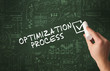 © ra2 studio - Hand drawing OPTIMIZATION PROCESS inscription with white chalk on blackboard, new business concept