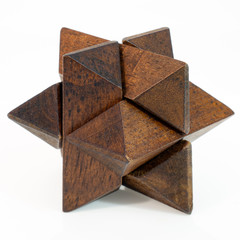 Wall Mural - Isolated wood puzzle thinking concept.