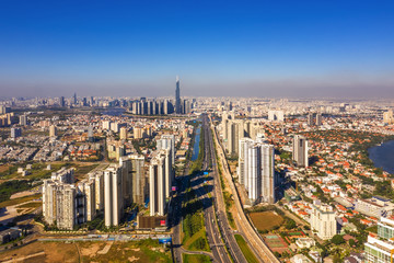 Top view aerial of Ha Noi highway and Cat Lai crossroads, Ho Chi Minh City with development buildings, transportation, infrastructure, Vietnam. View from Cat Lai crossroads to 1 district
