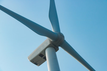 wind turbine against blue sky