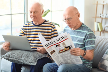 Poster - Elderly men resting together at home