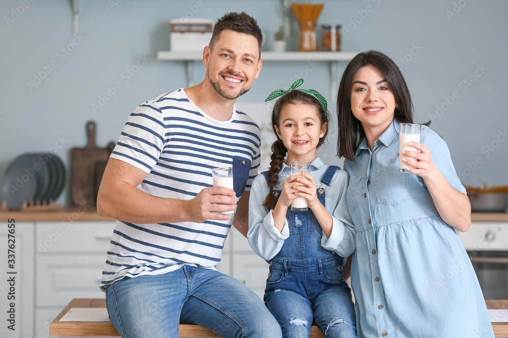 Family drinking milk at home