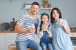 © Pixel-Shot - Family drinking milk at home