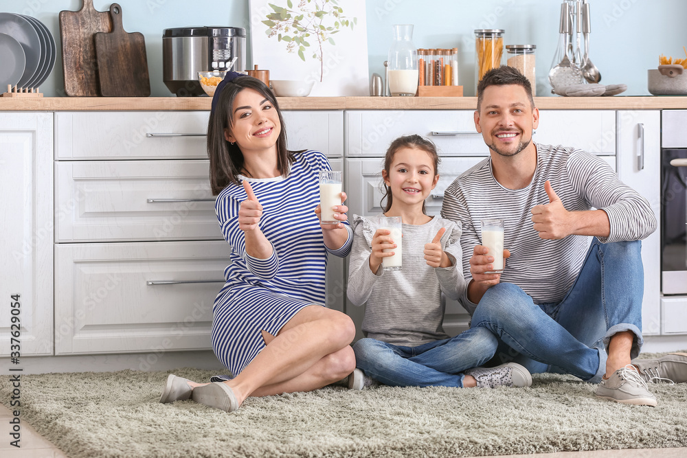 Family drinking milk at home