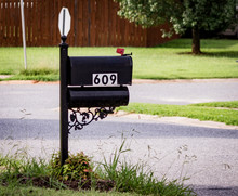 Number 609 On Mailbox By Road