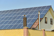 © andov - Solar panels for converting sunlight into electrical energy on the roof of a private house.