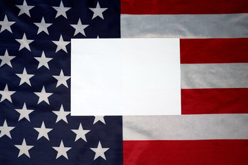 Stay home. White sheet on the background of the american flag. Copy space.