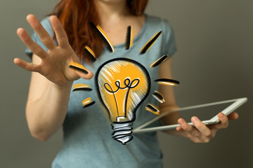 idea lamp concept in hand.