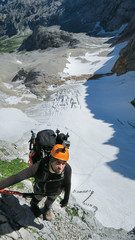 Wall Mural - Passage via ferrata with a large exposure and an amazing view of the mountain range and the glacier