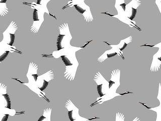 Seamless pattern with Japanese cranes. A flock of flying birds. Design for fabric, Wallpaper.