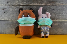 Children's Soft Bear And Piglet With Face Masks, Symbolizes Protection Against Coronavirus Covid-19