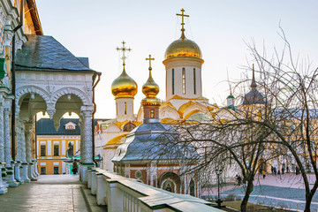 Carved columns and a large “autumnal” porch of the refectory overlooking the Trinity Cathedral and the Mikheevsky Church. Sergiev Posad. Russia