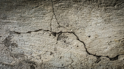 Sticker - old stone wall with a crack. texture for design