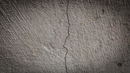 Sticker - old stone wall with a crack. texture for design