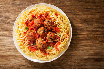 Wall Mural - plate of pasta with meatballs, top view