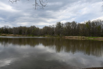 Sticker - Lake Reflection Under a Cloudy Sky