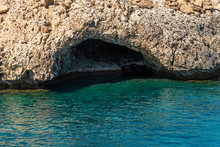 Grotto In The Coastline Of The Sea Of Limestone, Island Of Cyprus