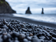 Black Pebbles As A Background In The Iceland Sea Shore. Abstract Composition. Design - Image