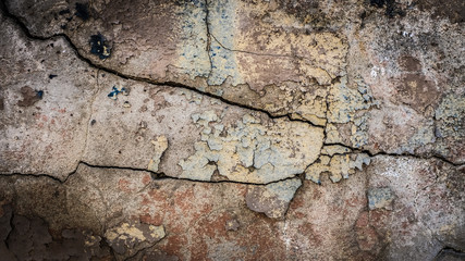 Sticker - old stone wall with a crack. texture for design