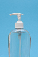 Clear plastic bottle of hand sanitizer, antimicrobial liquid gel.