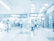© jakkapan - abstract medical background for design. Blurred dispense counter of hospital or clinical with people.