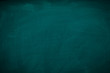 © pattanawit - Green Chalkboard. Chalk texture school board display for background. chalk traces erased with copy space for add text or graphic design. Backdrop of Education concepts