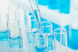 © Nana_studio - A pipette that adds fluid to one of several tubes. Lab tests