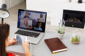 Canvas Print - Pretty stylish schoolgirl studying homework math during her online lesson at home, social distance during quarantine, self-isolation, online education concept, home schooler