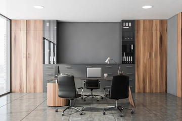 gray and wooden ceo office interior
