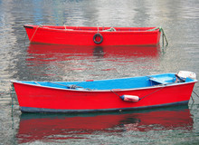 High Angle View Of Red Boat Moored In Sea