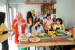 © Odua Images - woman with friend preparing some food for dinner and breakfasting