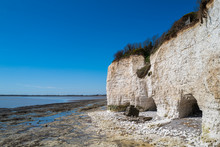 The White Chalk Cliffs For Ramsgate West Looking Towards Pegwell Bay On A Late Spring Day With Blue Sky.
