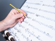 Male Hands Writing A Score, Music Concept