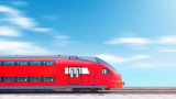 Fototapeta Zachód słońca - modern train in motion head car side view against blurred clouds sky background Commuter double decker train moving fast Wide panorama landscape banner for design