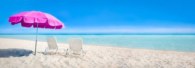 Wall Mural - beach panorama with sun chair and parasol as background image