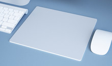 High Angle View Of Computer Keyboard And Mouse With Pad On Blue Background