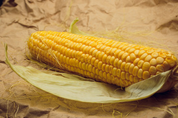 Wall Mural - Boiled corn with tops. Yellow agriculture organic vegetarian fresh summer food close up.