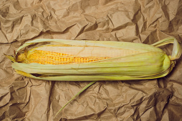 Wall Mural - Boiled corn with tops. Yellow agriculture organic vegetarian fresh summer food close up.